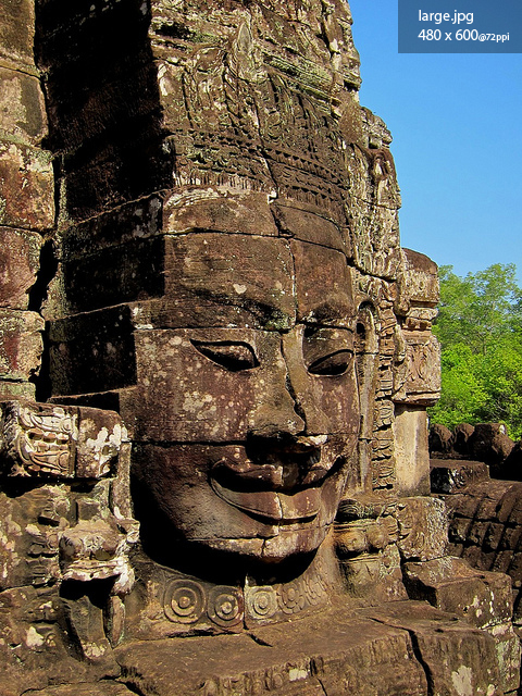 A giant carved face at a temple in Angkor Wat, Cambodia